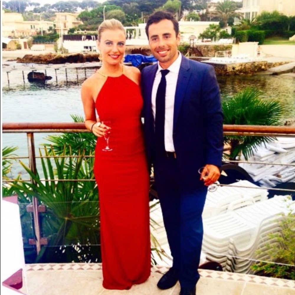 Red Floor Length Gown w/ Gold Chain at the top